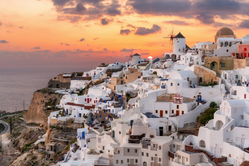Beautiful Santorini island at sunset in Oia village, Santorini island, Greece.